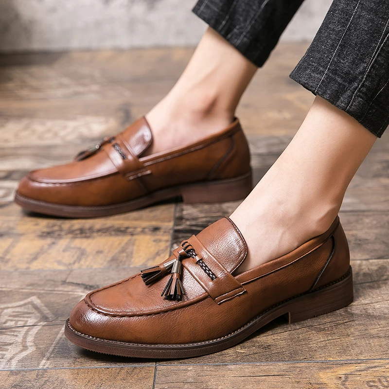 Leder Loafers mit Quasten