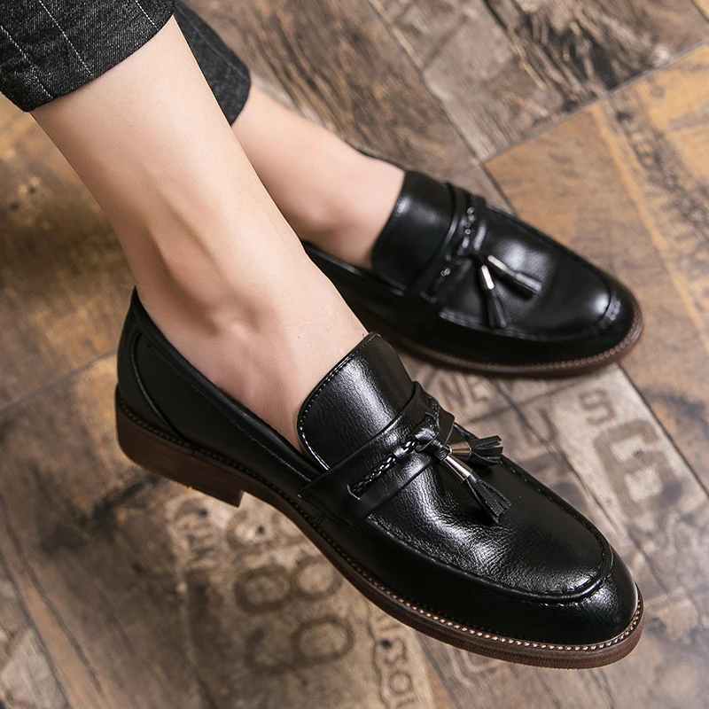 Leder Loafers mit Quasten