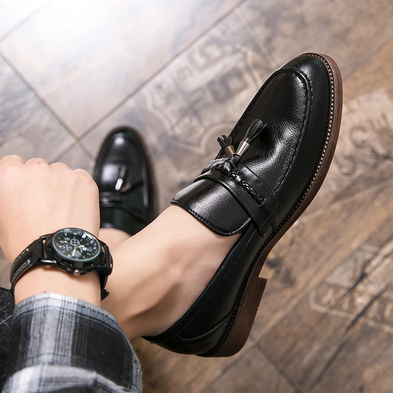 Leder Loafers mit Quasten