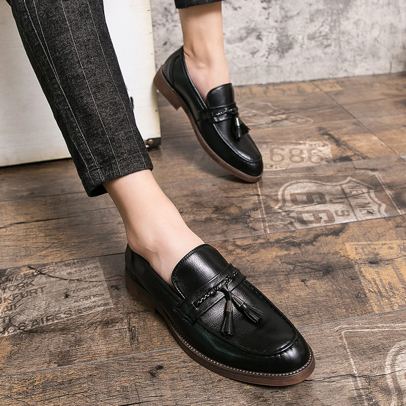 Leder Loafers mit Quasten