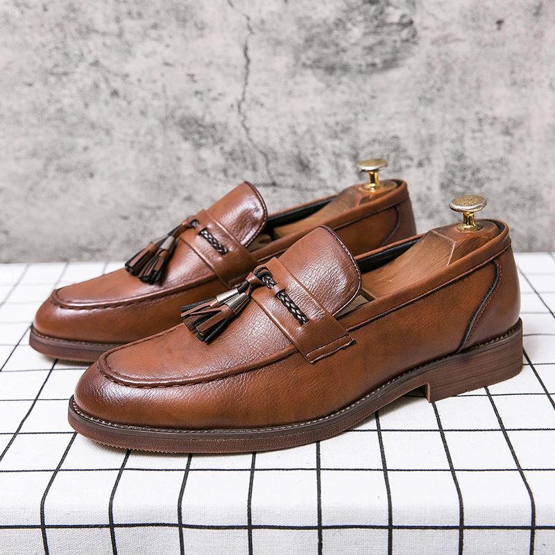 Leder Loafers mit Quasten
