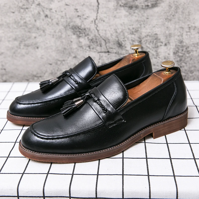 Leder Loafers mit Quasten